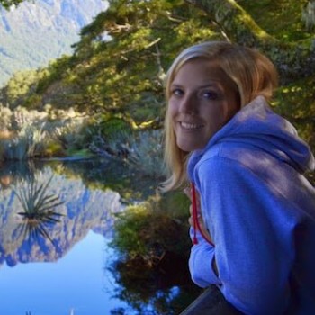 New zealand Portrait Julia at a lake with mountains mirrored in the water